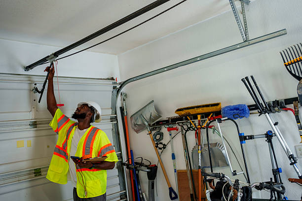 Professional Garage Door Panel Replacement technician working in Painesville, OH